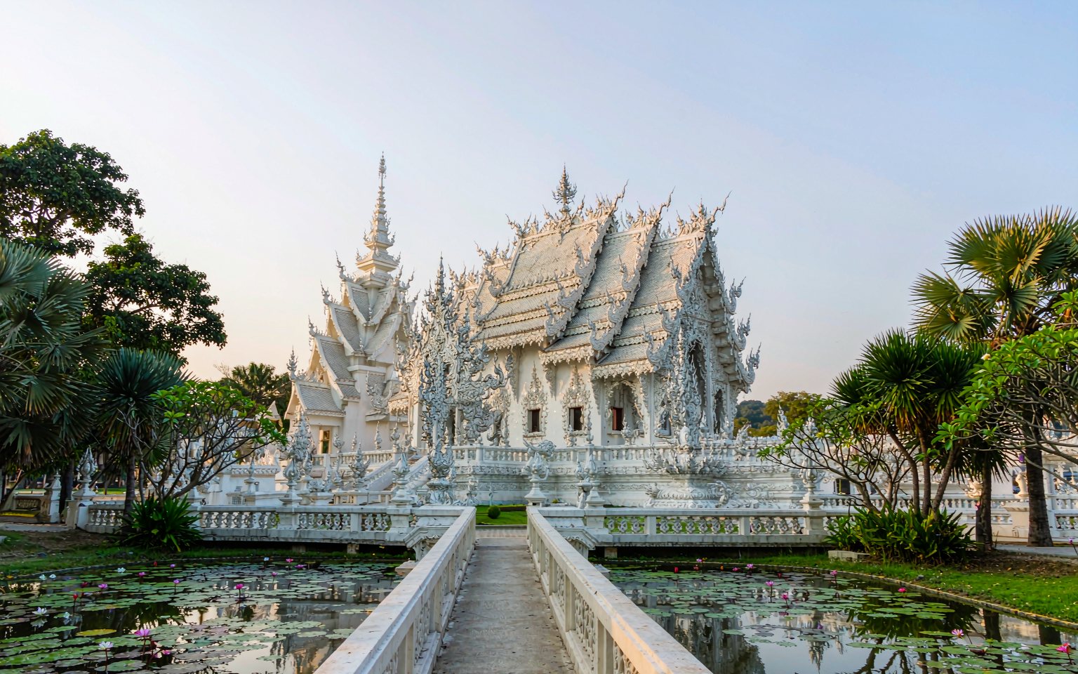The White Temple near Chiang Rai, seen across its lily pond