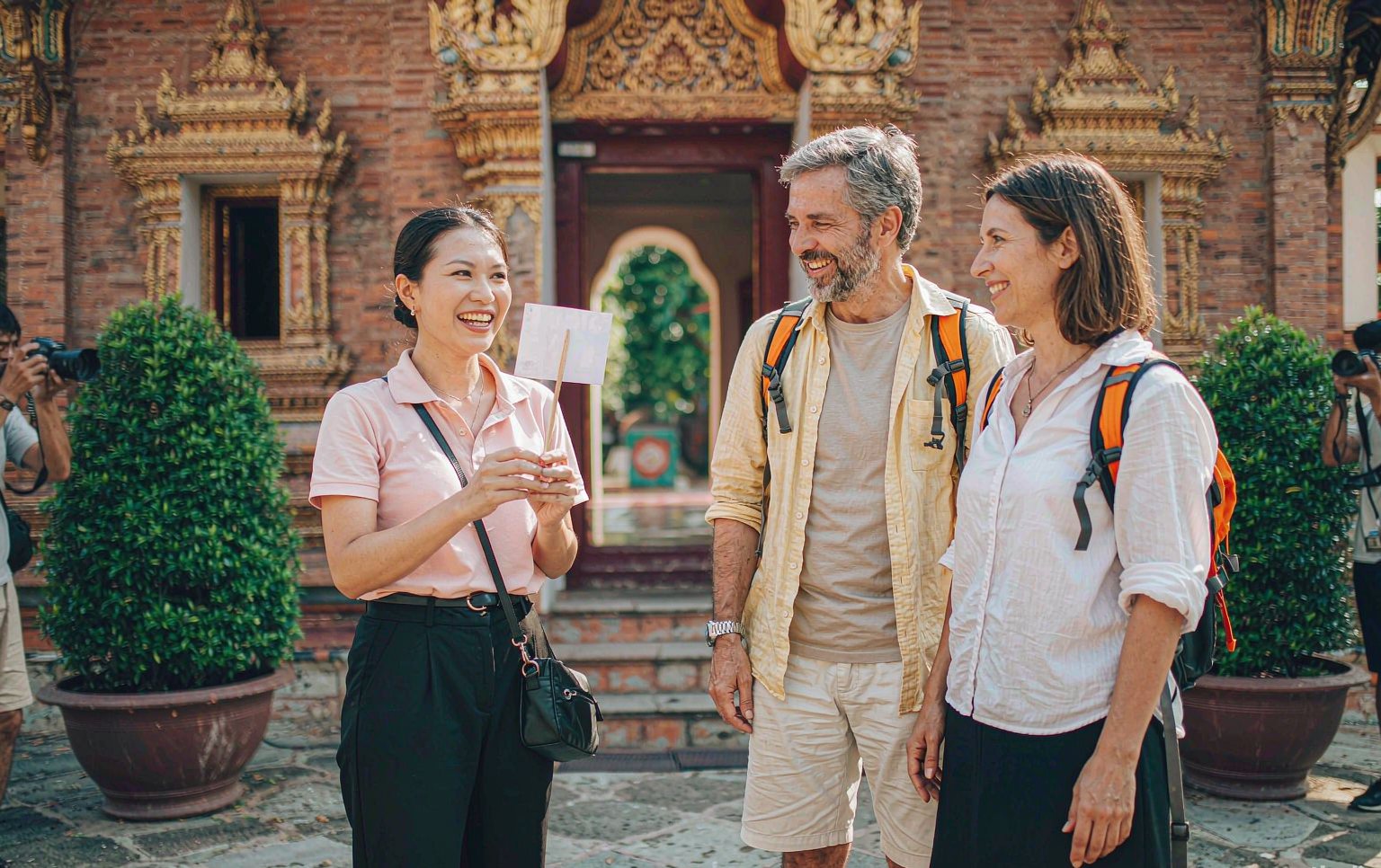A guide with travellers in Bangkok